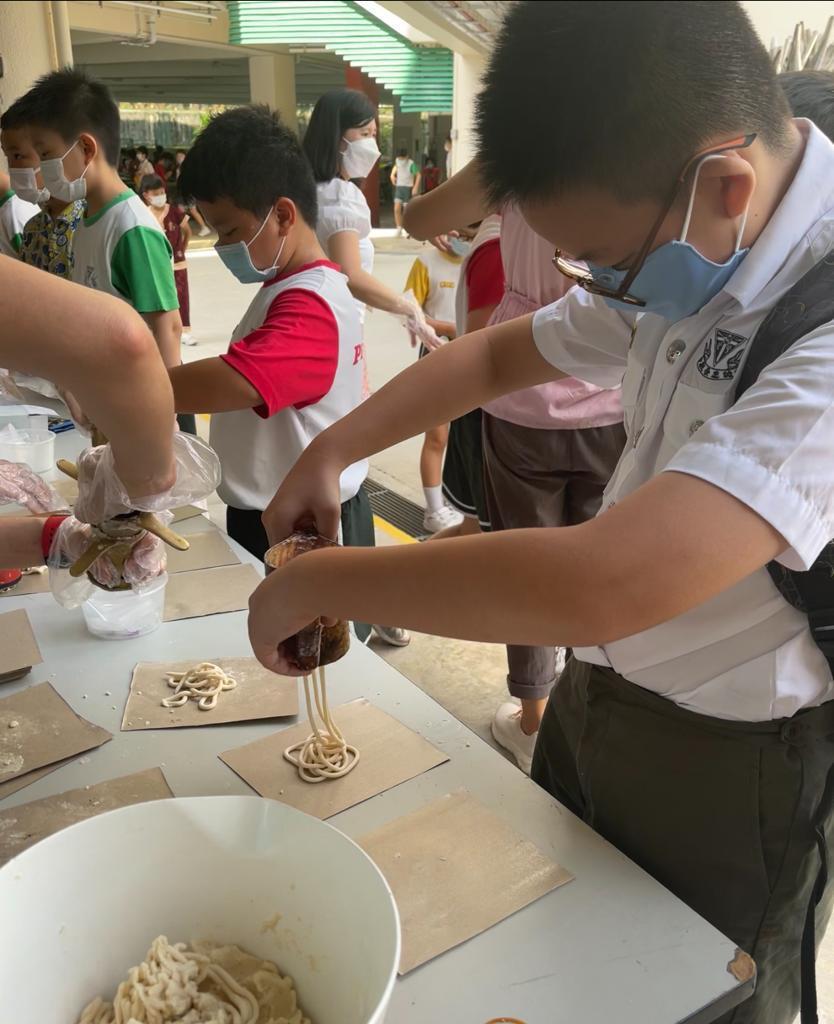 Making Murukku during Racial Harmony Day